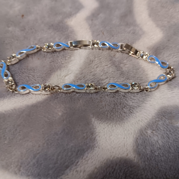 Blue enamel and crystal infinity bracelet. - Picture 14 of 14